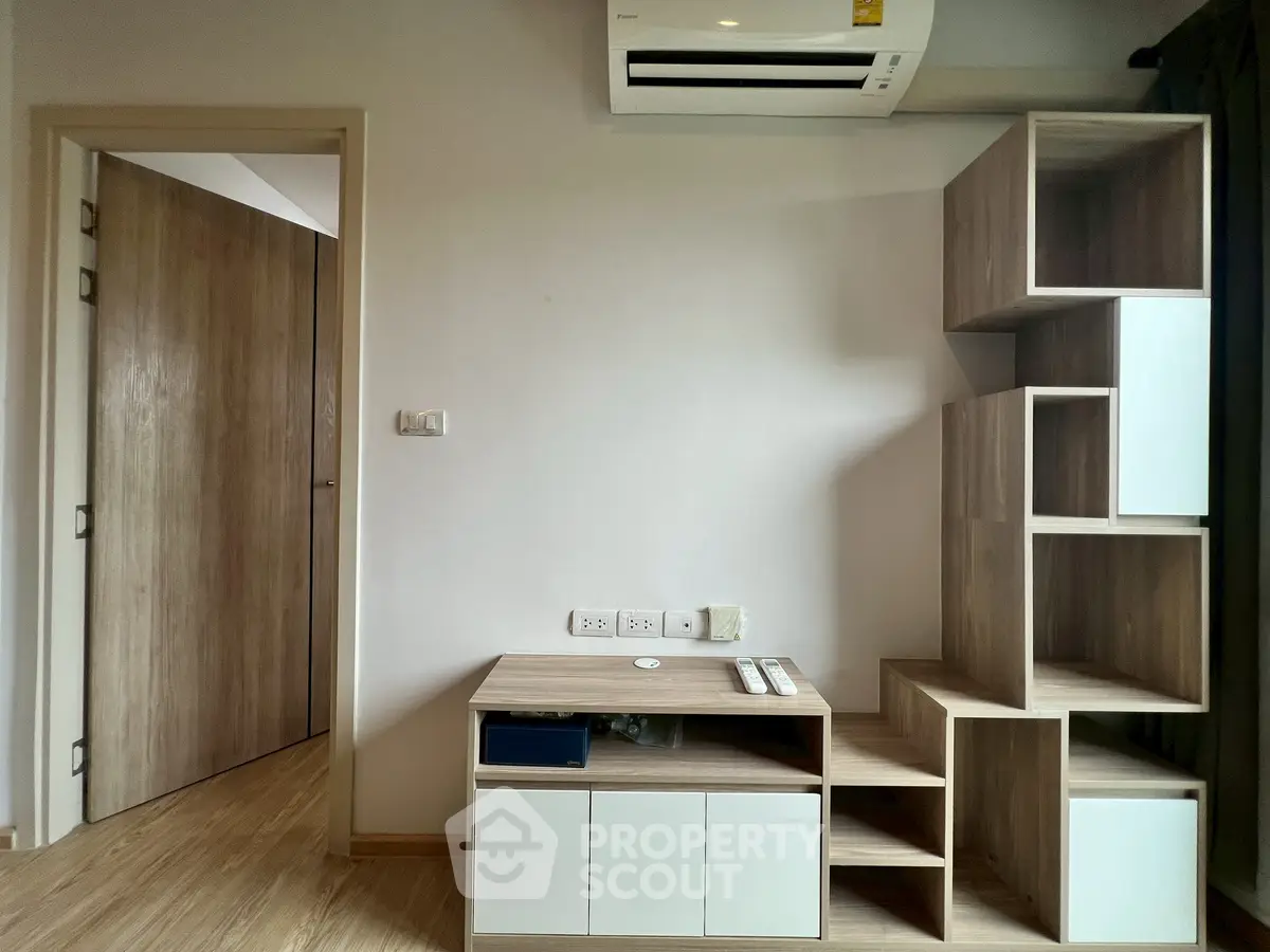 Modern interior with wooden storage and air conditioning unit