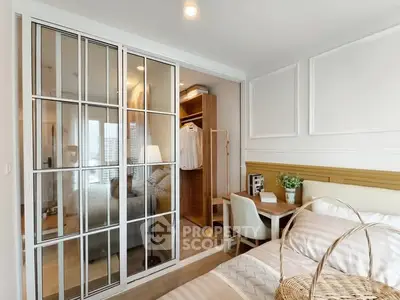 Modern bedroom with walk-in closet and stylish decor