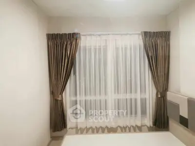 Elegant bedroom with luxurious curtains and soft lighting