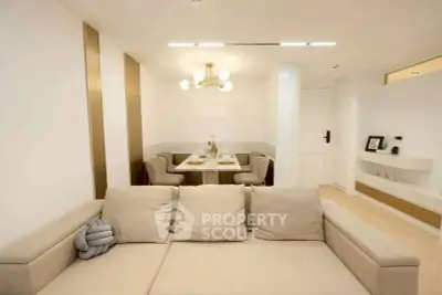 Modern living room with elegant dining area and stylish decor