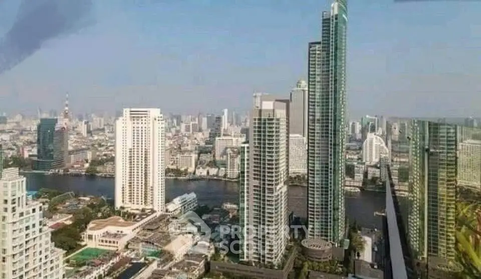 Stunning cityscape view showcasing modern skyscrapers and river, ideal for urban living enthusiasts.
