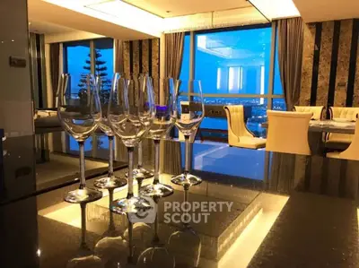 Luxurious dining area with elegant decor and stunning city view