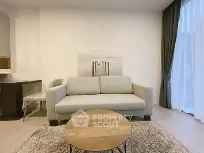 Modern living room with cozy sofa and stylish decor