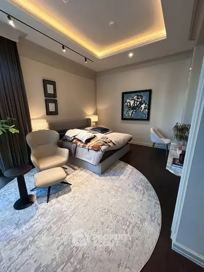 Luxurious bedroom with modern decor and ambient lighting