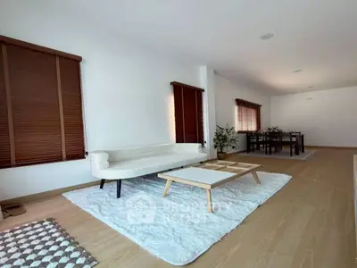 Spacious modern living room with stylish furniture and natural light
