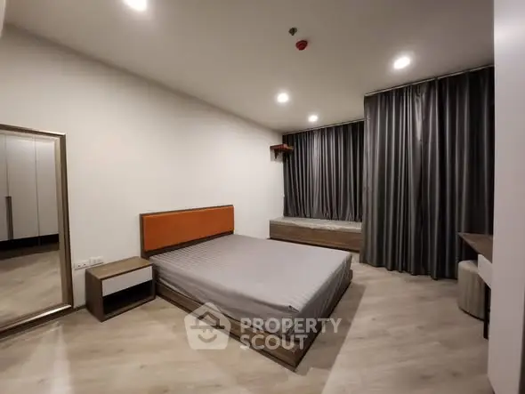 Modern minimalist bedroom with sleek design and neutral tones