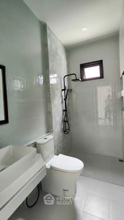 Modern bathroom with sleek fixtures and stylish shower design