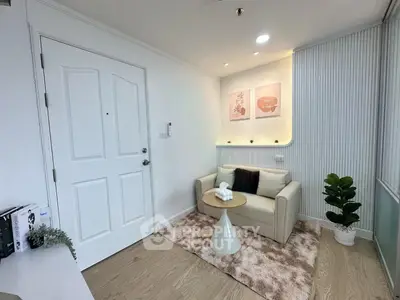 Charming small living room with cozy sofa and stylish decor
