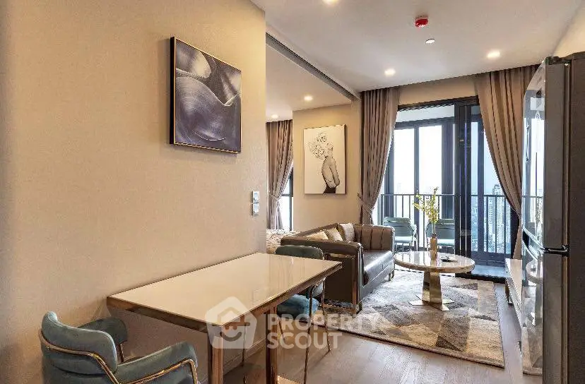 Modern living room with elegant decor and large windows leading to a balcony with city views.