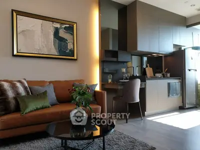 Stylish modern living room with open kitchen and elegant decor