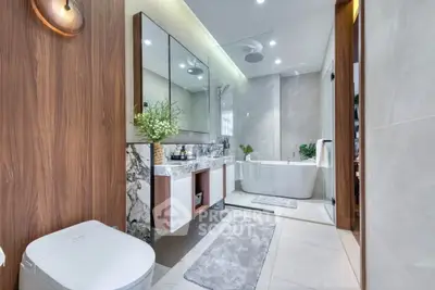 Luxurious modern bathroom with elegant fixtures and spacious design
