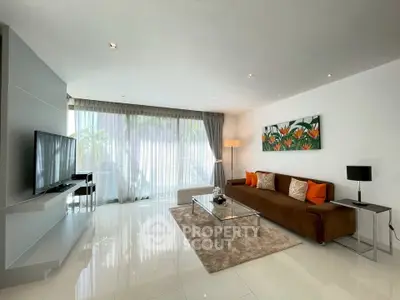 Spacious modern living room with sleek decor and large windows