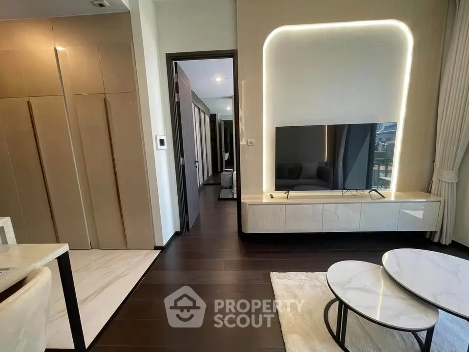 Modern living room with sleek TV unit and stylish furniture