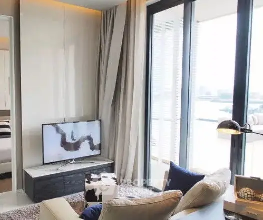 Modern living room with floor-to-ceiling windows and stylish decor in a high-rise apartment.