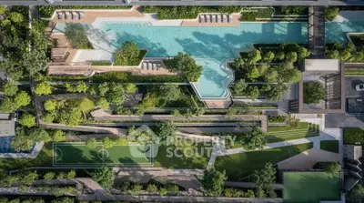 Stunning aerial view of luxury residential complex with pool and landscaped gardens.