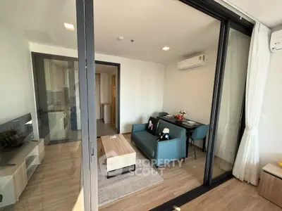 Modern living room with stylish furniture and open layout in a contemporary apartment.