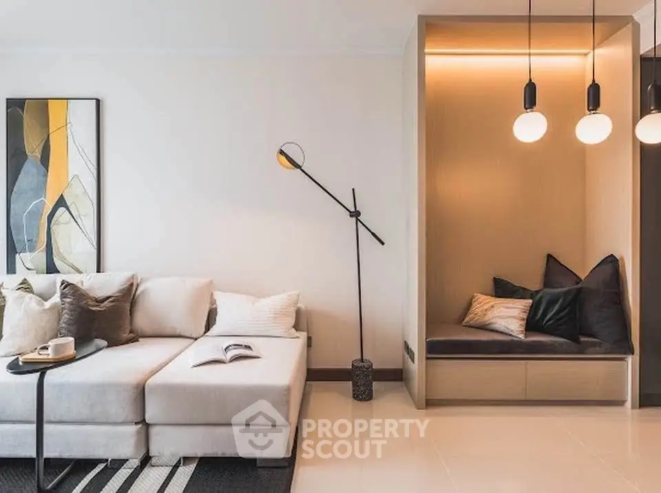 Modern living room with cozy seating nook and stylish decor