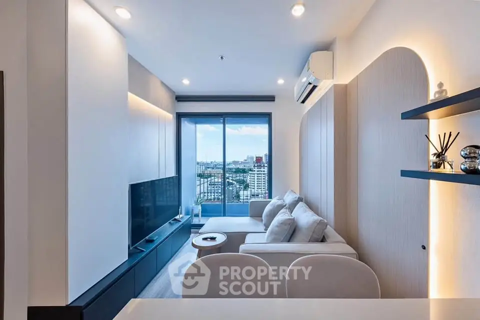 Modern living room with large window offering stunning city view, sleek furniture, and ambient lighting.