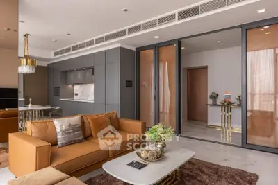 Luxurious modern living room with elegant decor and open kitchen layout