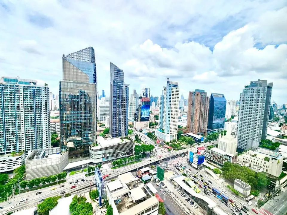 Stunning cityscape view showcasing modern skyscrapers and bustling urban life.