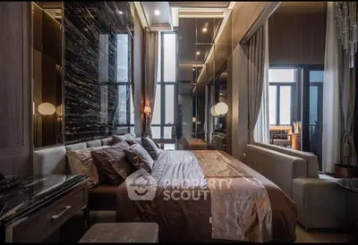 Luxurious bedroom with elegant decor and floor-to-ceiling windows