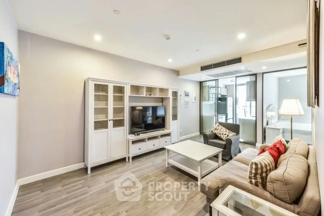 Spacious living room with modern furniture and natural light