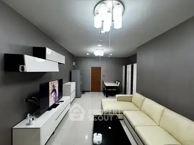 Modern living room with sleek furniture and stylish lighting