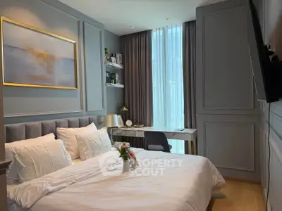 Luxurious bedroom with elegant decor and large window in modern apartment