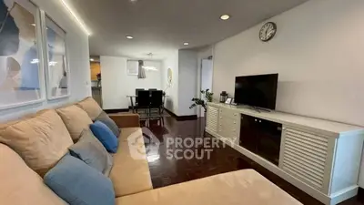 Spacious living room with elegant decor and modern furniture, perfect for relaxation and entertainment.