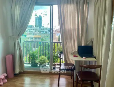 Bright study area with balcony view in modern apartment