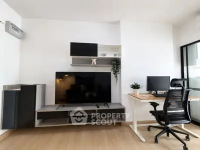 Modern living room with sleek TV setup and stylish home office desk
