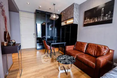 Modern living room with leather sofa and cityscape artwork, featuring sleek wooden flooring and stylish decor.