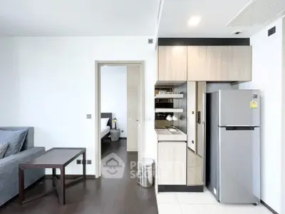 Modern apartment kitchen with sleek appliances and open layout