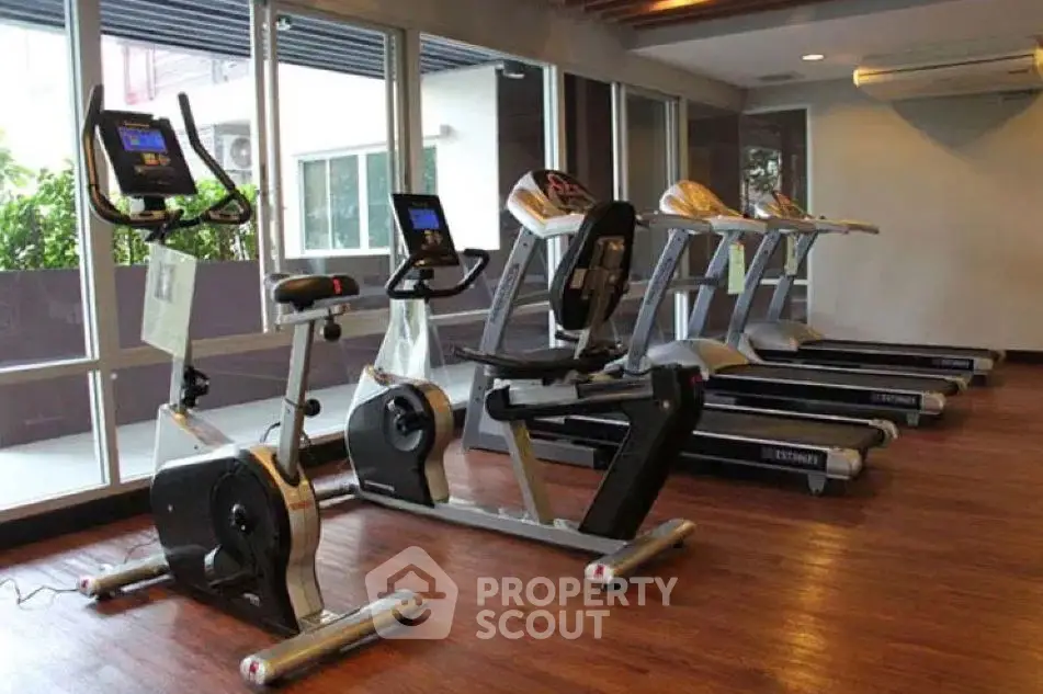 Modern gym with state-of-the-art equipment and natural lighting