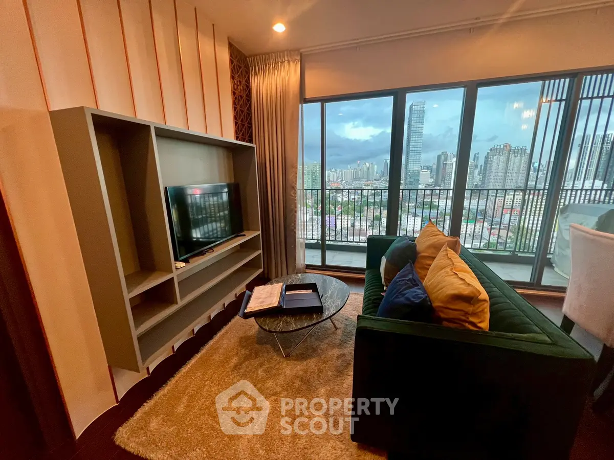 Modern living room with city view, stylish furniture, and large windows for natural light.