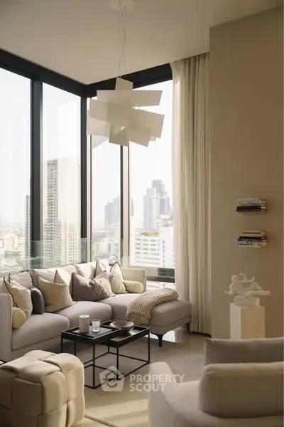 Luxurious modern living room with panoramic city views and elegant decor.