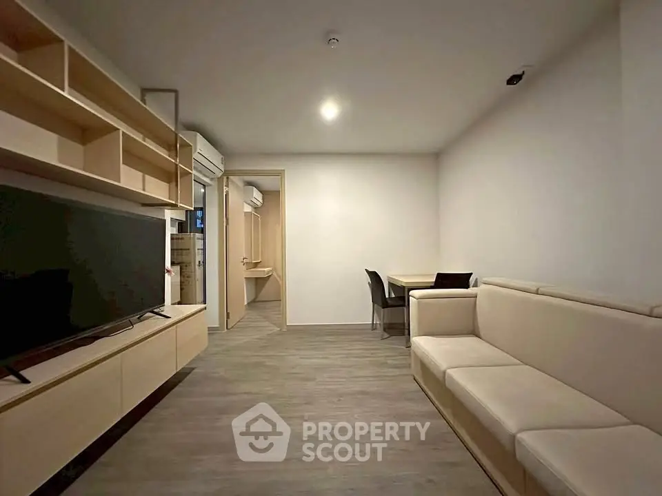 Modern living room with sleek furniture and open layout, perfect for contemporary living.