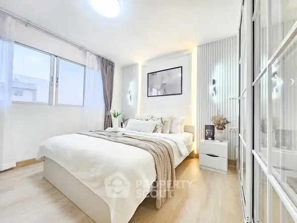 Bright and cozy bedroom with modern decor and natural light