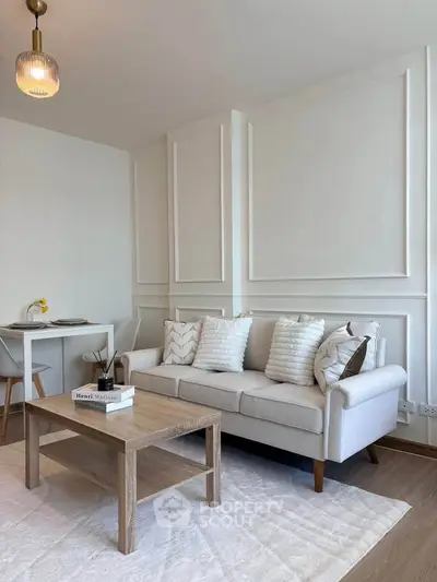 Elegant living room with modern decor and cozy seating area