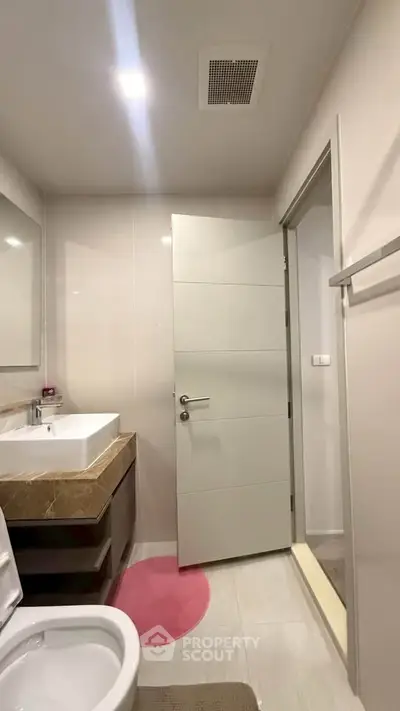 Modern bathroom with sleek fixtures and stylish vanity