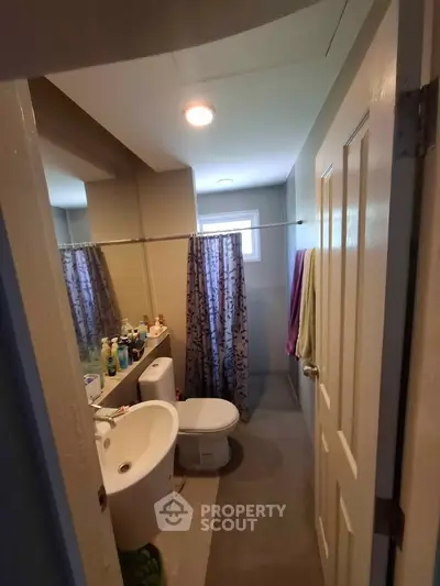 Cozy bathroom with modern fixtures and ample natural light