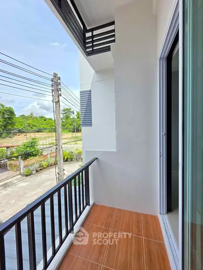 Spacious balcony with scenic view in modern apartment