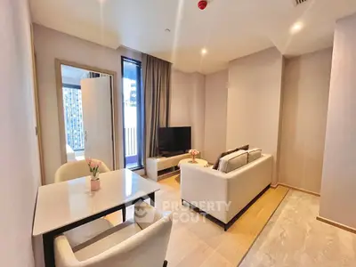 Modern living room with elegant decor and balcony view