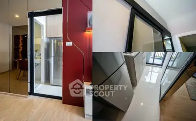 Modern kitchen with sleek design and stainless steel appliances in a contemporary apartment.