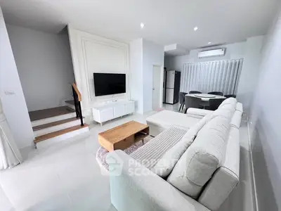 Spacious modern living room with elegant decor and open layout