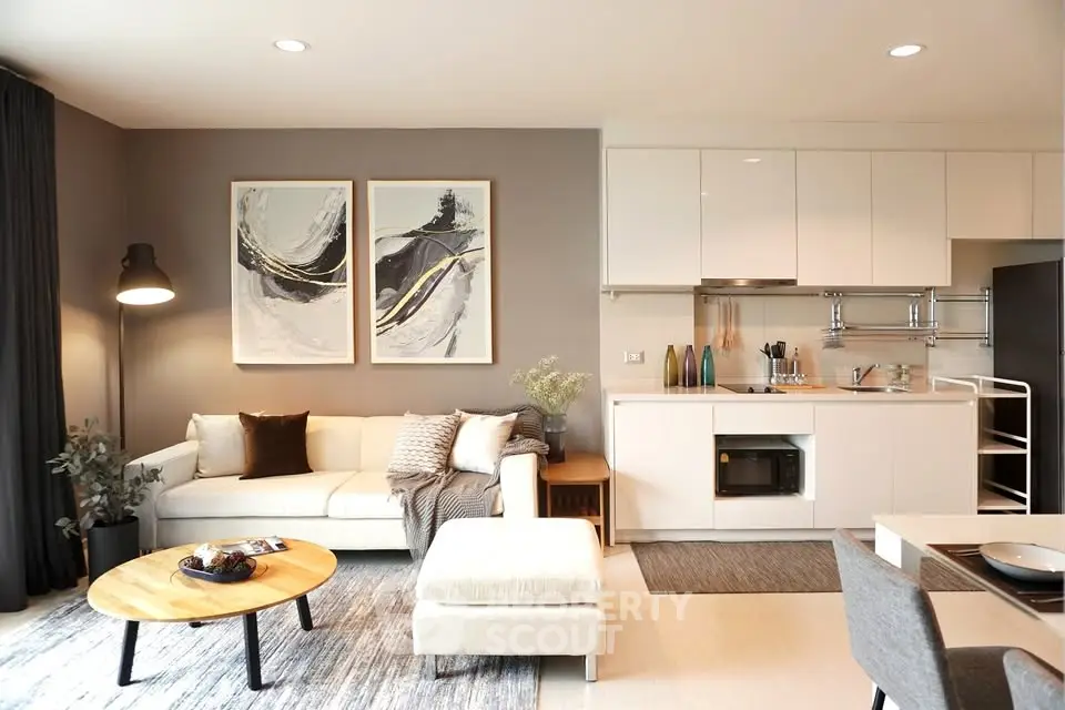 Modern living room with stylish decor and open kitchen layout