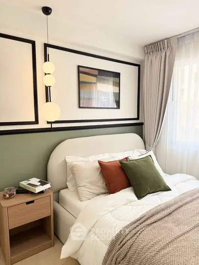 Cozy bedroom with modern decor, featuring a stylish bed, elegant lighting, and a serene ambiance.