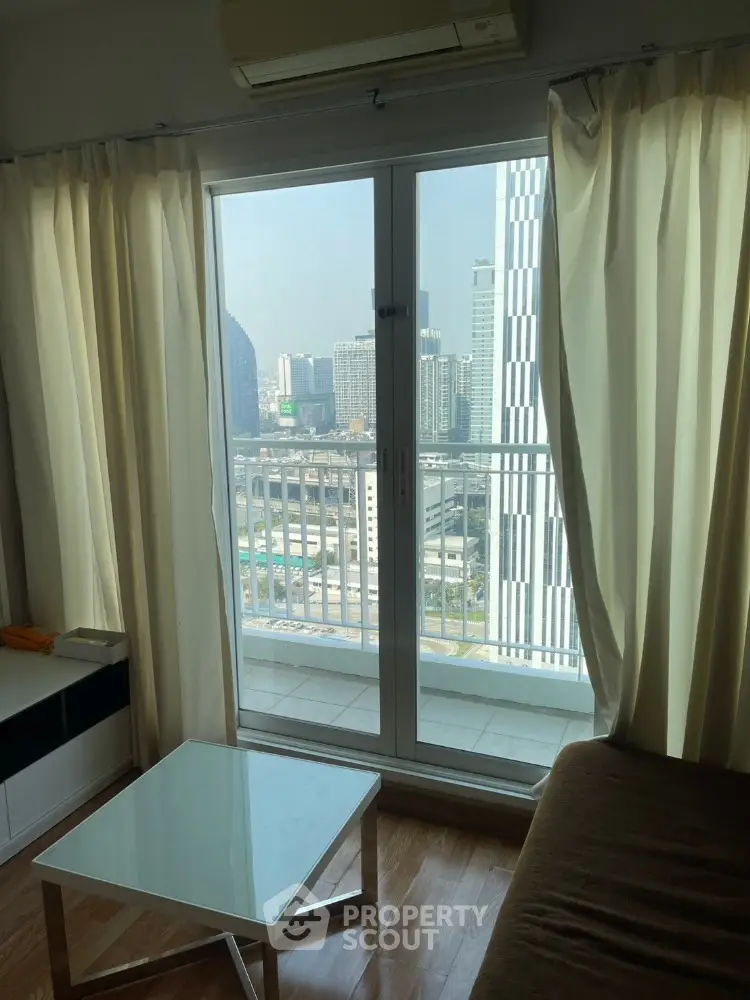 Modern apartment living room with city view balcony and sleek furniture