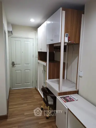 Compact study area with modern wooden furniture and storage solutions