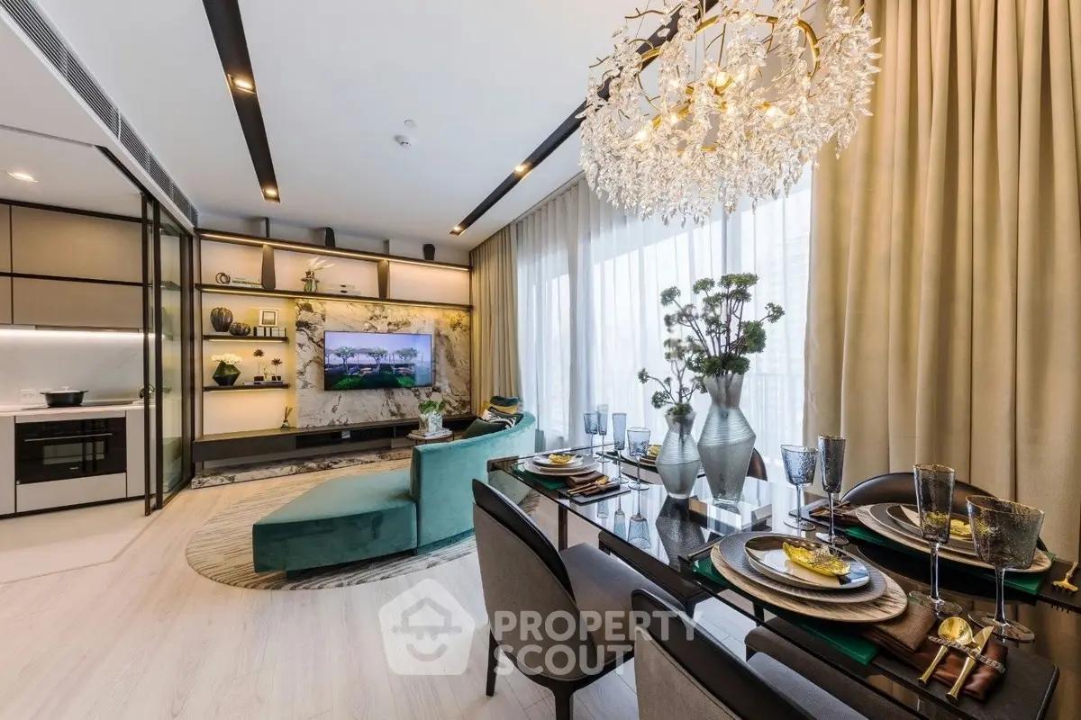 Luxurious open-plan living and dining area with elegant decor and modern furnishings.